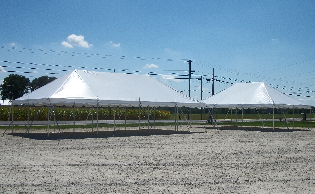 20 ft. x 40 ft. and 20 ft. x 30 ft. Classic Poles Tents in Stone Parking Lot