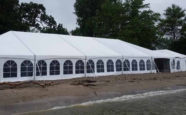 40 ft. x 100 ft. Aztec Jumbotrac Frame Tent on a beach of Lake Erie